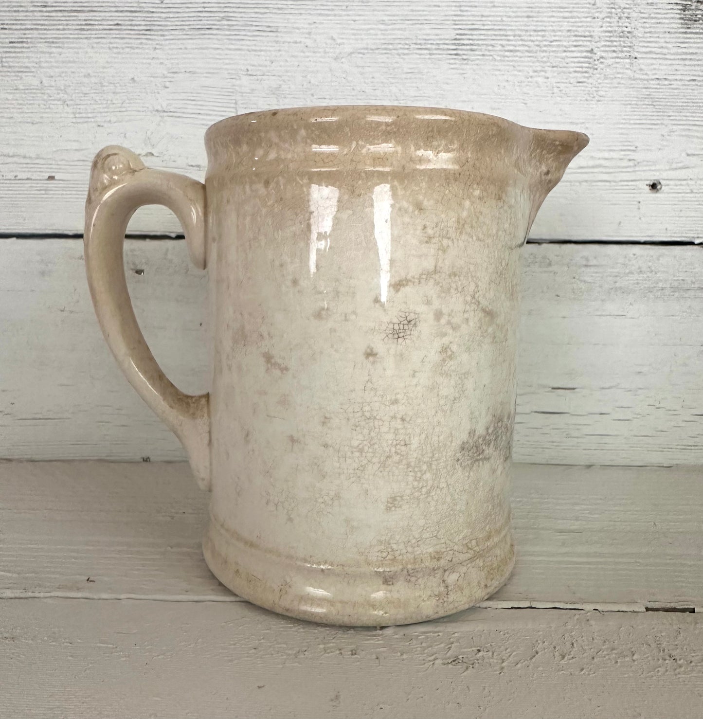 Stained Ironstone Milk Pitcher